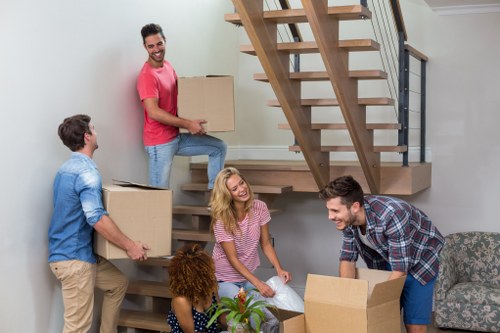 Cardiff removals team estimating a small city flat move