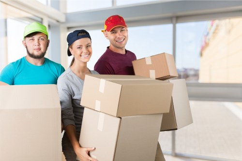 Packed office boxes and furniture for a business move