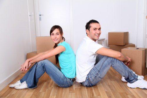 Professional movers handling furniture during a Cardiff relocation