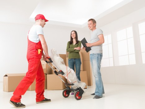 Cardiff man and van loading household items into a vehicle
