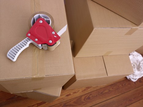 Business moving equipment and packed crates ready for transport